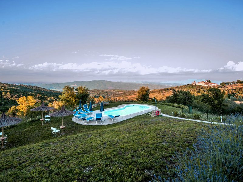 The inviting pool set among the hills of Tuscany
