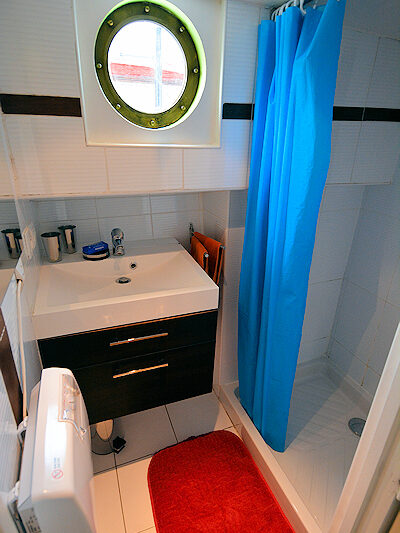 Shower room 1 is styled in bright flag colors.