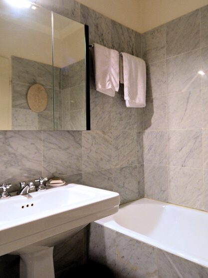There are two bathrooms at the Place des Galeries apartment, Bathroom 1 (with bathtub) and Bathroom 2 (with shower).