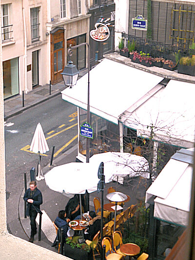 The Place des Galeries apartment is in a building on a street lined with shops, cafes, and a large number of galleries.