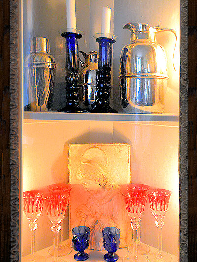 Detail of one of the four dining room china cabinets at the Place des Galeries apartment.