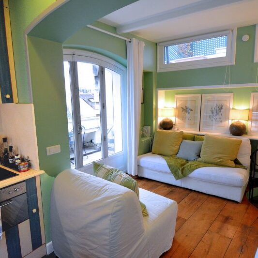 Note the French doors leading to the upper floor terrace.