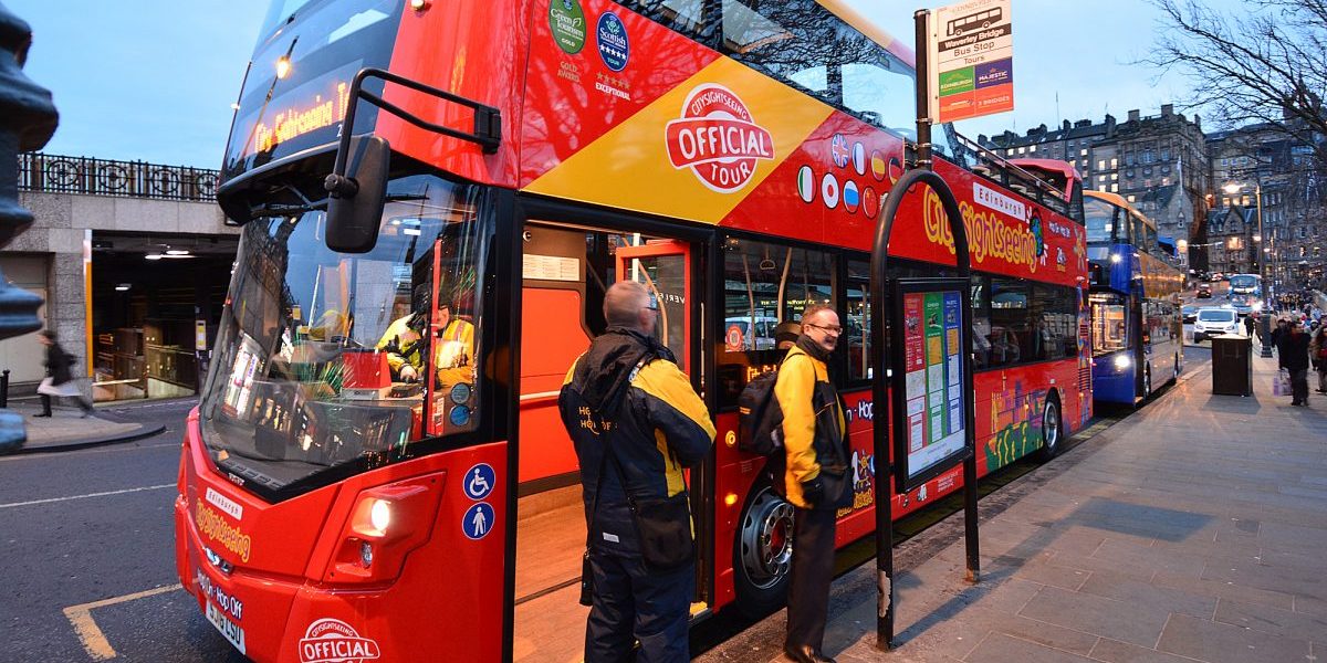 Edinburgh - Sightseeing Buses line up on Princes Street.