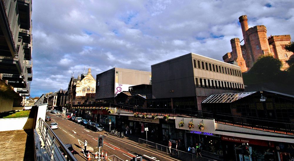 Southern view from Home At First's Inverness apartments: Bridge Street shops with Inverness Castle looming.