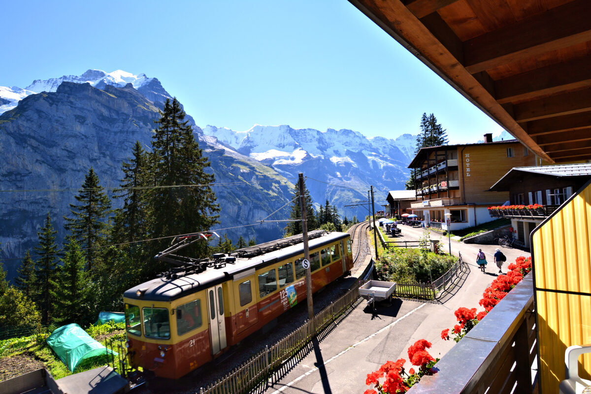 Chalet Eiger: 2nd floor, 2-bedroom apartment - balcony view with BLM train. Photo © Home At First.