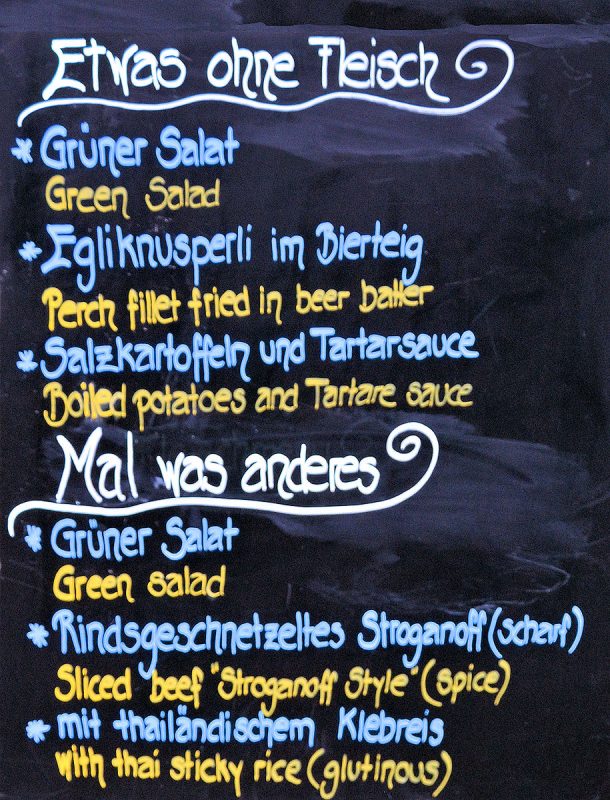 Restaurant menu blackboard in Mürren.