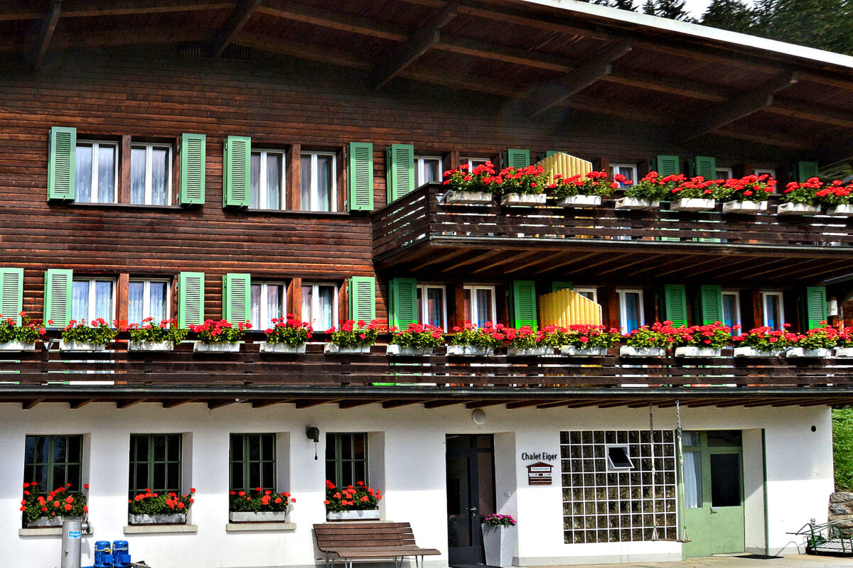 Chalet Eiger - Exterior Facade showing Entry plus front balconies of the 3 apartments. Photo © Home At First.