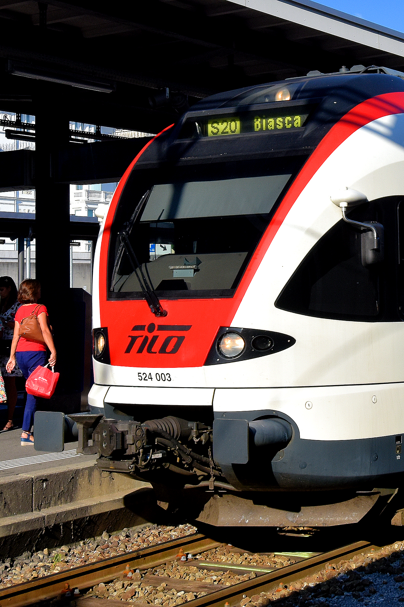 Muralto - TILO S20 train for Biasca boarding at Locarno station.