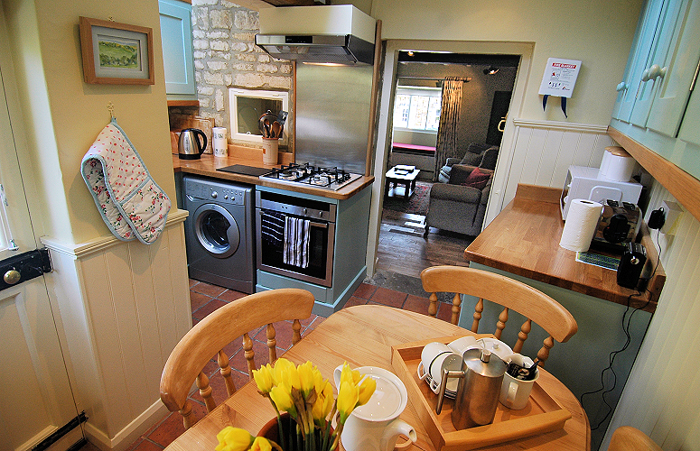 Chipping Campden: High Street Cottage kitchen and dining area. Photo copyright Home At First.