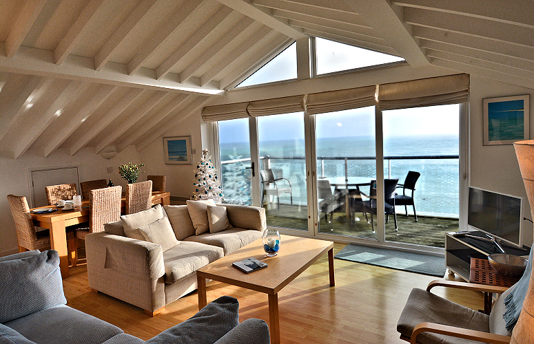 Coverack's Sea View Cottage features superb views of the English Channel from its living room and terrace. Photo copyright Home At First.