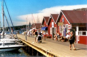 Bohuslän: Grebbestad harbor boardwalk. Northern Bohuslän makes a delightful stopping point when driving the West Coast from Gothenburg to Oslo. Photo © Home At First.