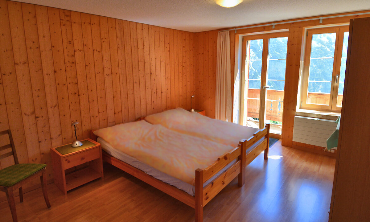 Chalet Jungfrau: north Twin Bedroom with Balcony. Photo © Home At First.