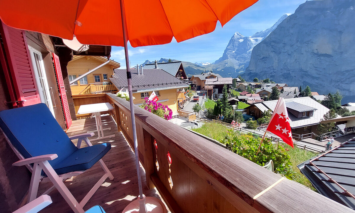 Chalet Silberhorn - Middle Apartment - Furnished Balcony with Eiger view. Photo © Home At First