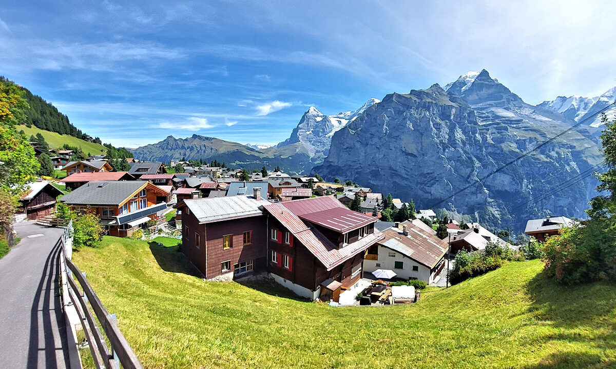 Panorama from behind Chalet Silberhorn with Mürren and the Bernese Alps. Photo © Home At First.