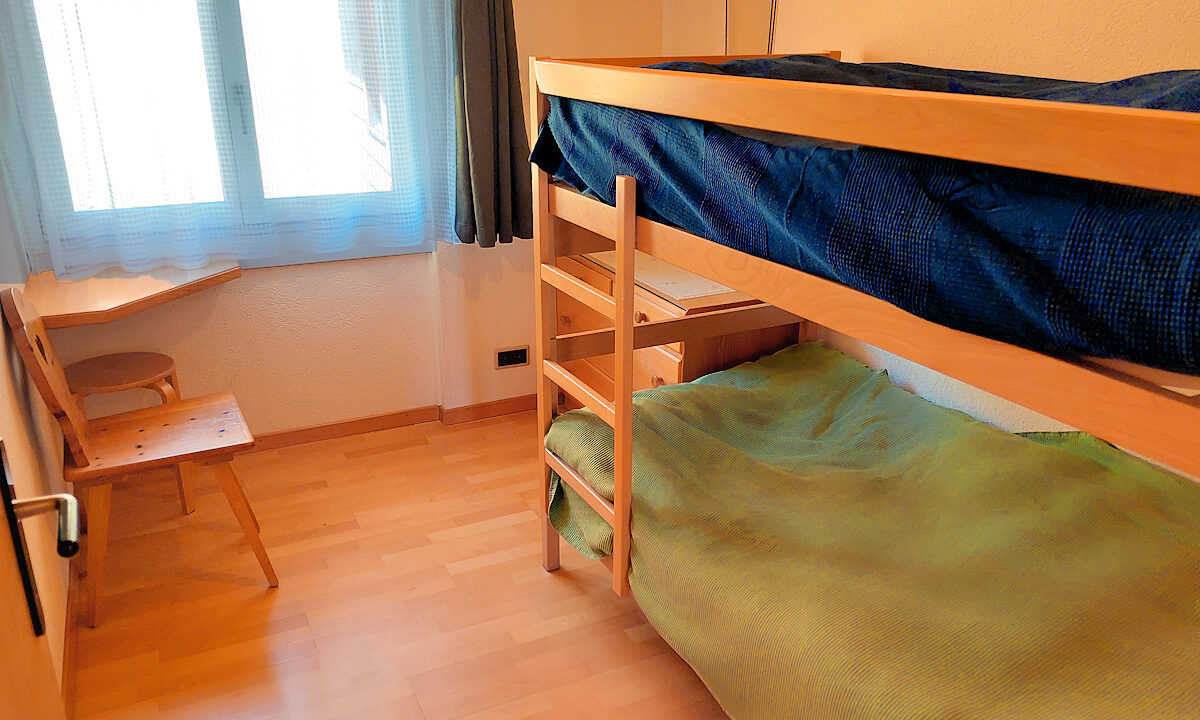 Chalet Silberhorn - Upper Apt - Bunk bedroom. Photo © Home At First.