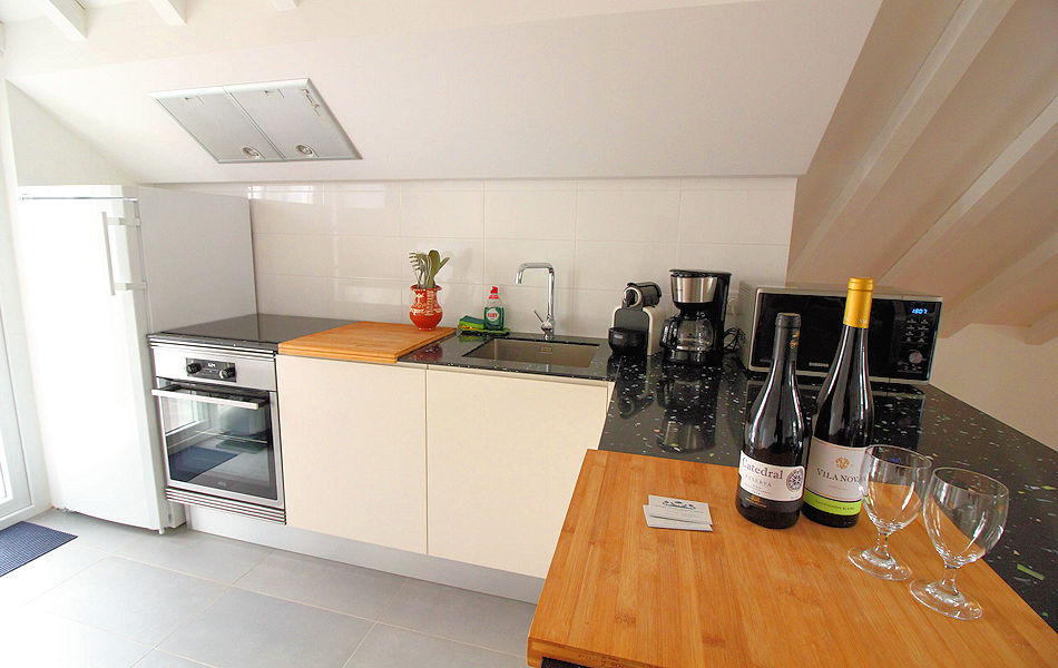 Central Cascais Apts: 3-bdrm apt - Kitchen. Photo courtesy the owner.