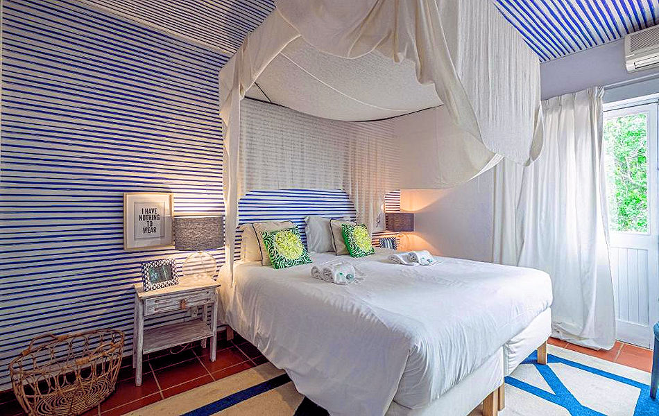 Central Vilamoura Villa: canopy double bedroom. Photo courtesy the agency.