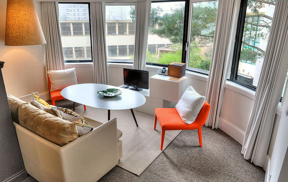 Maisonette Apartment Lower Floor: living-dining area with bow window view. Photo courtesy the owner.