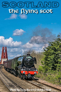 The historic Flying Scotsman steam train dressed as The Cathedrals Express exiting the Forth Bridge near Edinburgh. Photo by Tony Marsh © VisitScotland.